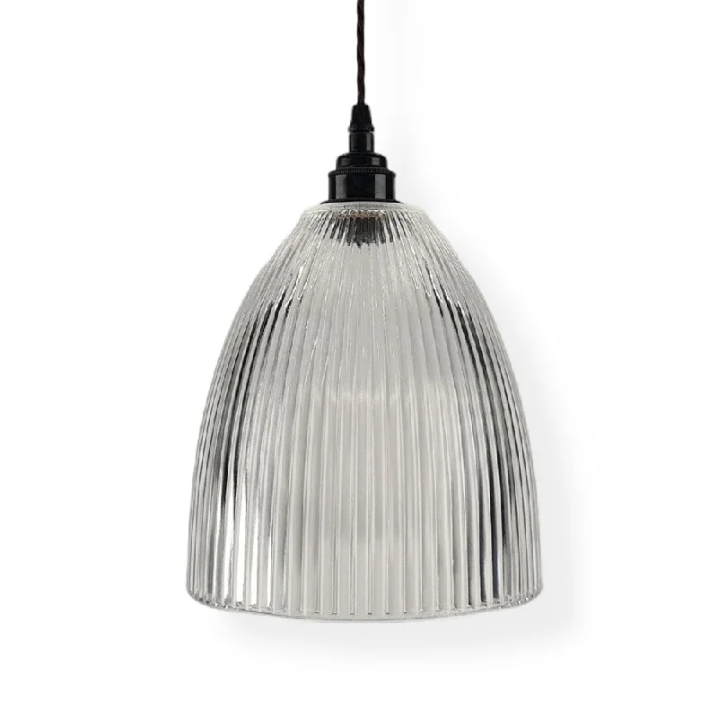 Introducing the Deritend Elongated Prismatic Ribbed Glass Pendant Light, in four sizes. Elegant and versatile, this pendant light adds sophistication to any space.