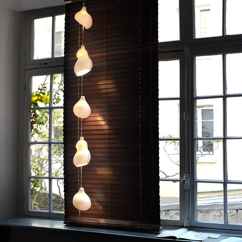 asian - inspired wall lamps with bamboo or paper shades for a zen - like GUIRLANDE ESTOMAQUÉE, blanc